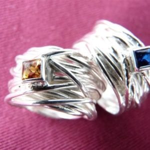 Zwei Wickelringe mit Princes Cut Steinen