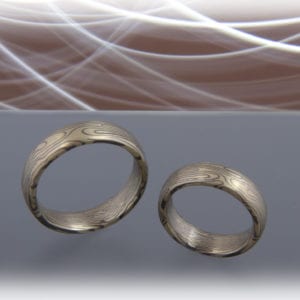 Spiegelbildliche Mokume Gane Ringe in Grüngold 585 und Palladium 500